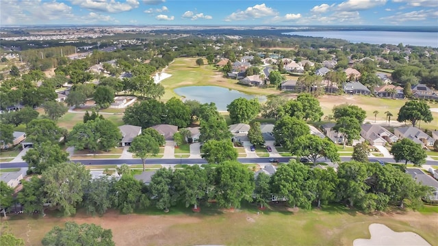 aerial view featuring a water view, a residential view, and view of golf course