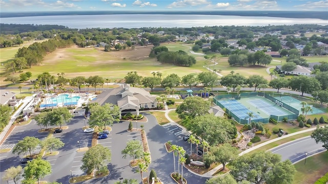 bird's eye view with view of golf course and a water view