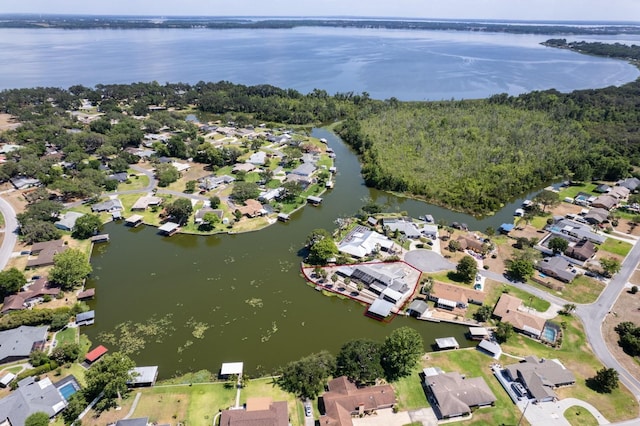 aerial view with a water view and a residential view