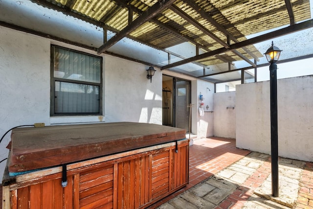 view of patio featuring a hot tub