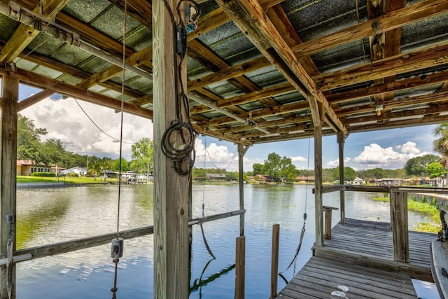 dock area featuring a water view