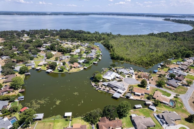 bird's eye view featuring a residential view and a water view