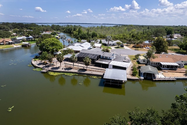 bird's eye view featuring a water view and a residential view