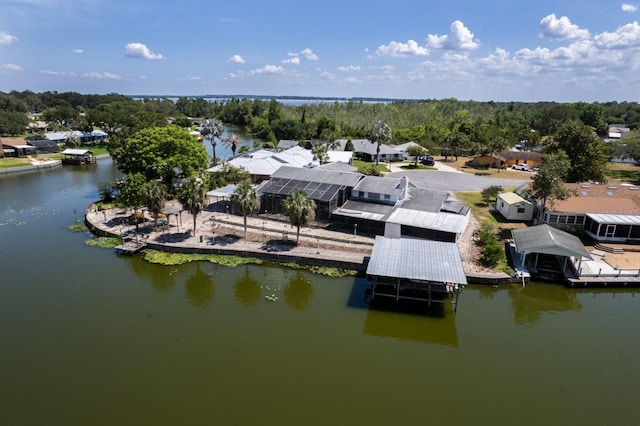 aerial view with a water view and a residential view