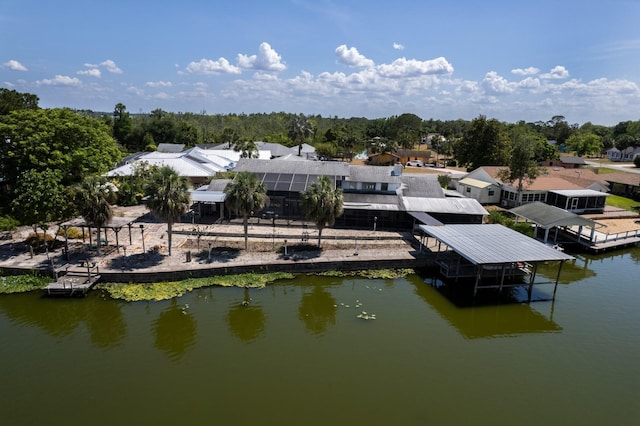 dock area with a water view and a residential view