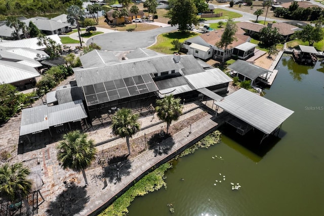 aerial view with a water view and a residential view