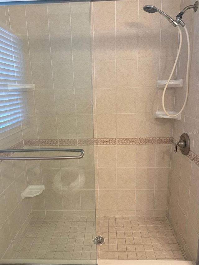 bathroom featuring a stall shower