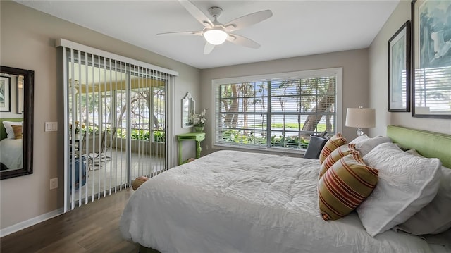 bedroom with baseboards, ceiling fan, and wood finished floors