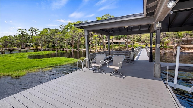 12104 Elbert St, Clermont, FL 34711 - dock featuring a water view and view of scattered trees