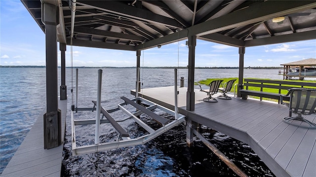 12104 Elbert St, Clermont, FL 34711 - dock area featuring boat lift and a water view