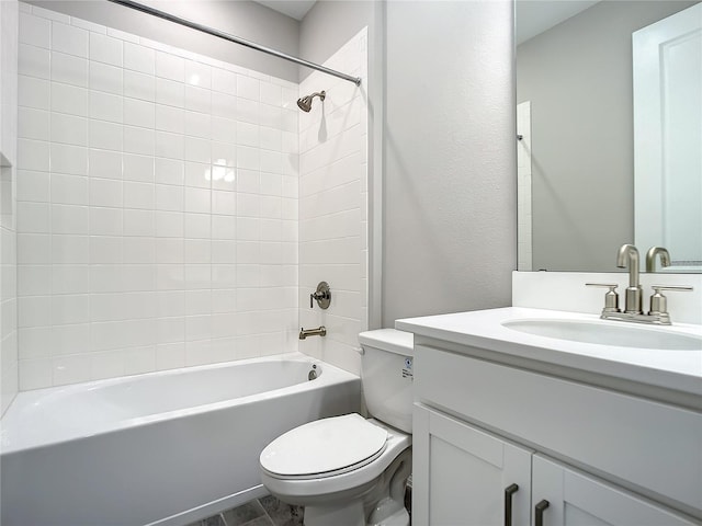 full bath with toilet,  shower combination, and vanity