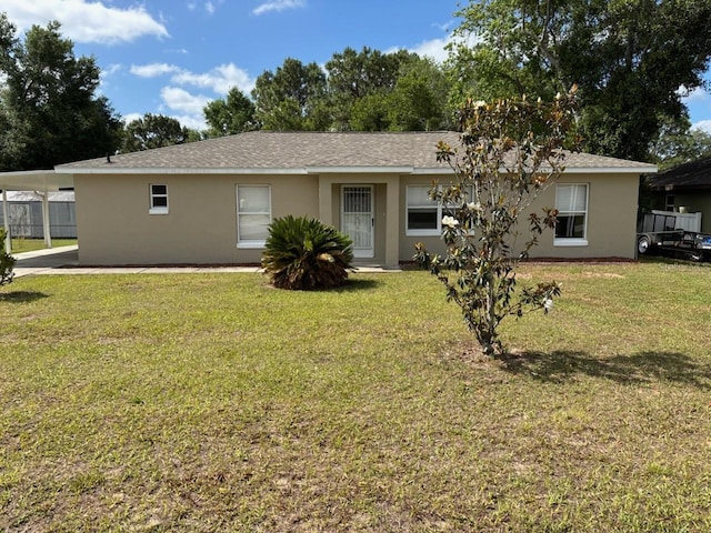 4046 E Bennett St, Inverness, FL 34453 - single story home featuring stucco siding and a front yard