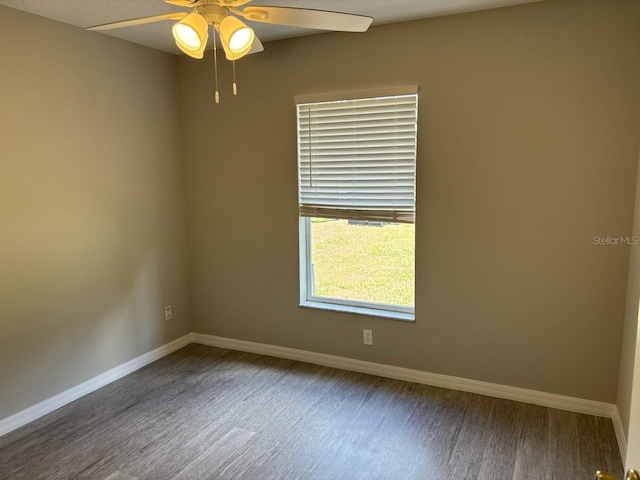 4046 E Bennett St, Inverness, FL 34453 - empty room with a ceiling fan, baseboards, and wood finished floors
