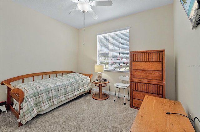 bedroom featuring carpet flooring, baseboards, and ceiling fan