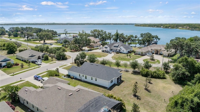 aerial view with a residential view and a water view