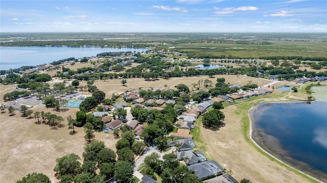 bird's eye view with a water view and a residential view