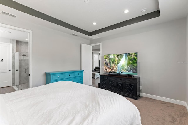 carpeted bedroom with baseboards, recessed lighting, ensuite bath, and visible vents