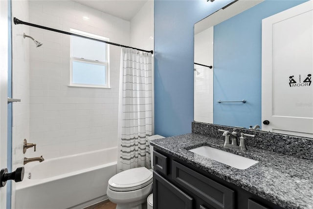 full bath with vanity, shower / bathtub combination with curtain, and toilet