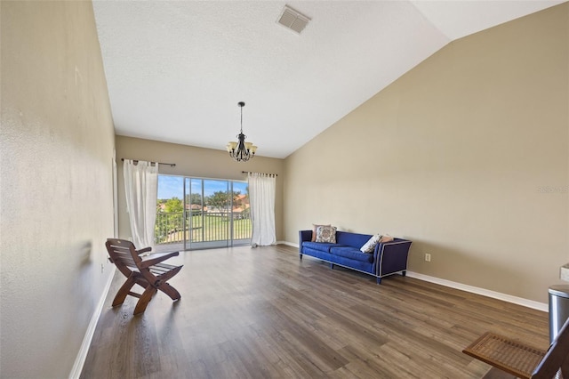 5492 Compass Pt, Oxford, FL 34484 - sitting room with baseboards, visible vents, an inviting chandelier, and wood finished floors