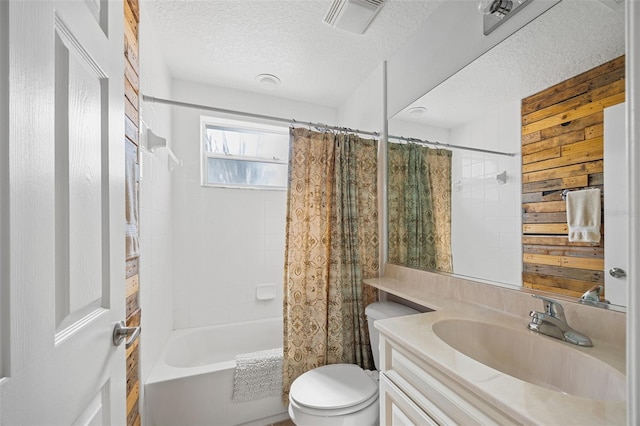 5492 Compass Pt, Oxford, FL 34484 - bathroom with a textured ceiling, wood walls, vanity, toilet, and shower / bathtub combination with curtain