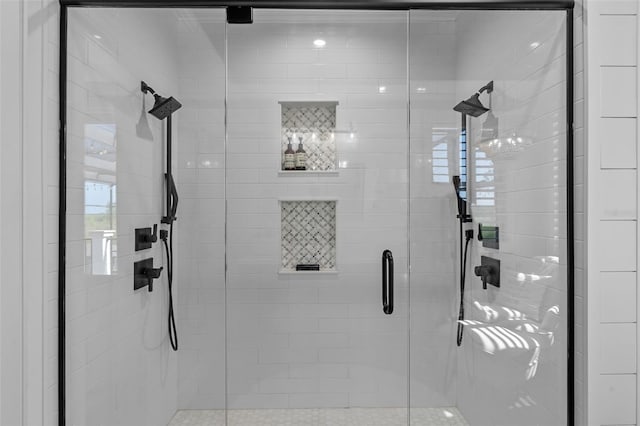 full bath with a shower stall