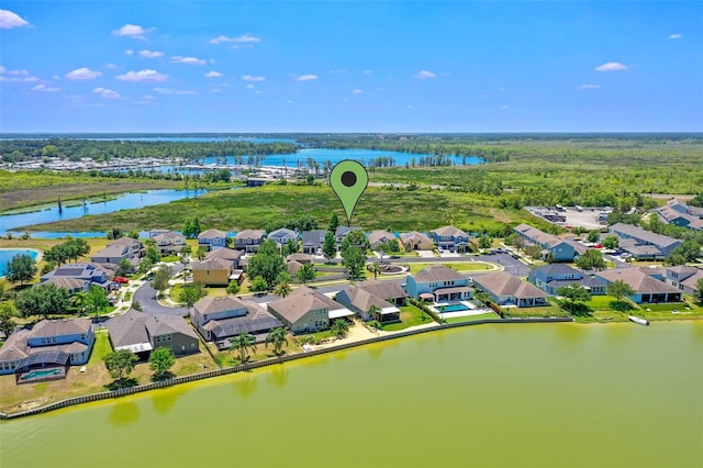 aerial view featuring a water view and a residential view