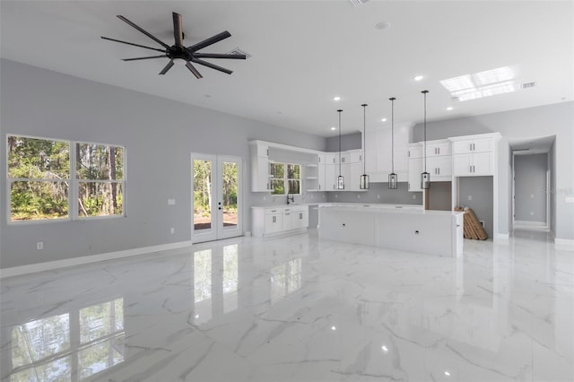 42191 Cashew St, Eustis, FL 32736 - unfurnished living room featuring french doors, light marble finish flooring, recessed lighting, and a ceiling fan