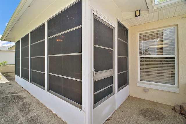 705 Grand Vista Trl, Leesburg, FL 34748 - exterior space featuring stucco siding