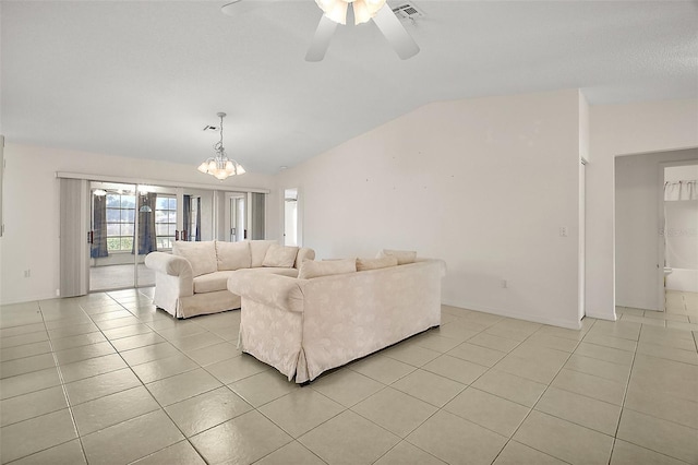 705 Grand Vista Trl, Leesburg, FL 34748 - living area featuring ceiling fan with notable chandelier, lofted ceiling, light tile patterned flooring, and visible vents