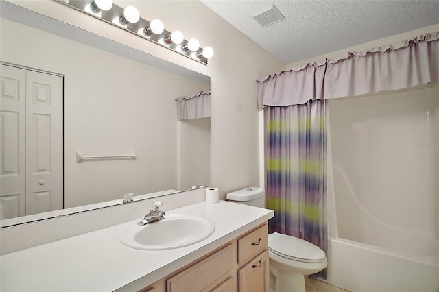 705 Grand Vista Trl, Leesburg, FL 34748 - full bath with a textured ceiling, visible vents, vanity, toilet, and shower / tub combo with curtain