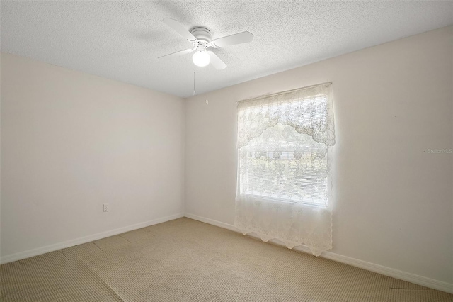 705 Grand Vista Trl, Leesburg, FL 34748 - unfurnished room featuring a textured ceiling, ceiling fan, light carpet, and baseboards
