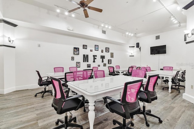 office area featuring visible vents, rail lighting, and light wood finished floors