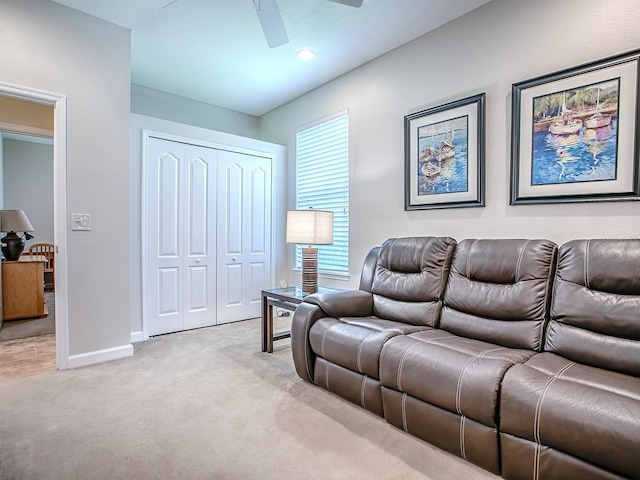3775 Brantley Place Cir, Apopka, FL 32703 - living area with a ceiling fan, light colored carpet, and baseboards