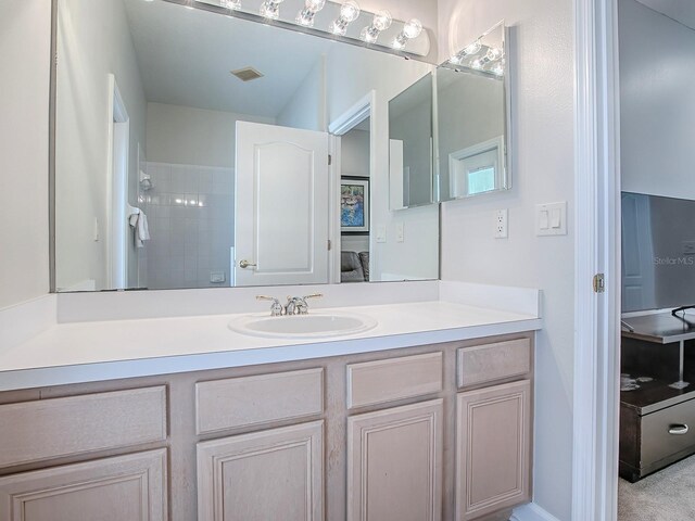 3775 Brantley Place Cir, Apopka, FL 32703 - bathroom featuring vanity and a tile shower