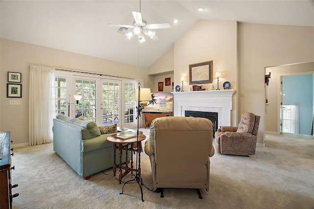 carpeted living area with a ceiling fan, high vaulted ceiling, baseboards, and a fireplace