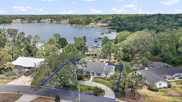 birds eye view of property featuring a water view