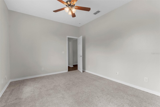11344 Gallinule Ave, Weeki Wachee, FL 34613 - carpeted empty room featuring a ceiling fan, baseboards, and visible vents