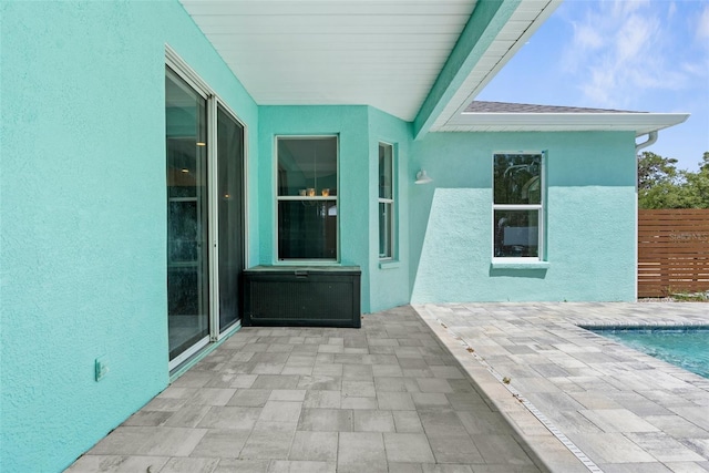 11344 Gallinule Ave, Weeki Wachee, FL 34613 - view of patio / terrace featuring fence