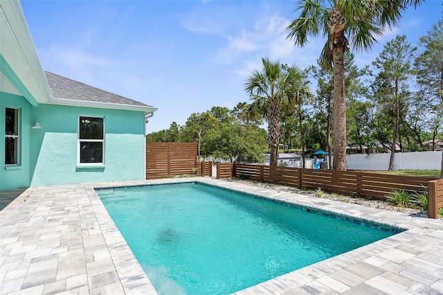 11344 Gallinule Ave, Weeki Wachee, FL 34613 - view of swimming pool featuring a fenced in pool and a fenced backyard