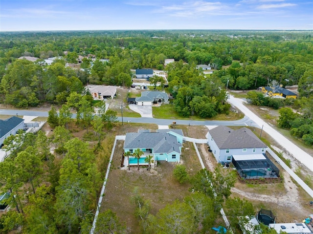 11344 Gallinule Ave, Weeki Wachee, FL 34613 - birds eye view of property with a view of trees and a residential view