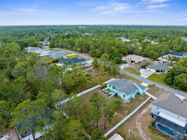 11344 Gallinule Ave, Weeki Wachee, FL 34613 - birds eye view of property featuring a residential view and a wooded view