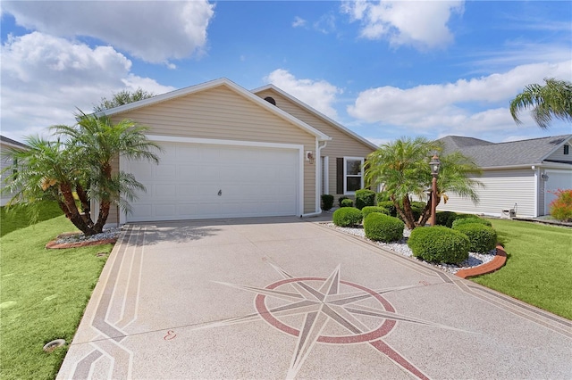 ranch-style house with an attached garage, a front lawn, and concrete driveway
