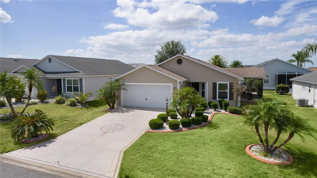 ranch-style home featuring a garage, concrete driveway, central AC, and a front yard