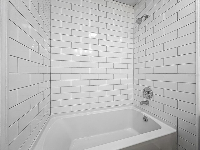 full bath featuring shower / bathtub combination