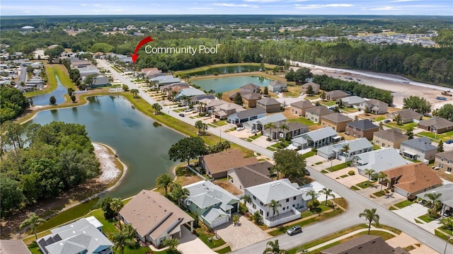 aerial view featuring a water view and a residential view