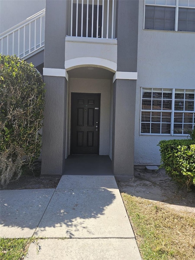 14049 Fairway Island Dr Unit 118, Orlando, FL 32837 - property entrance featuring stucco siding