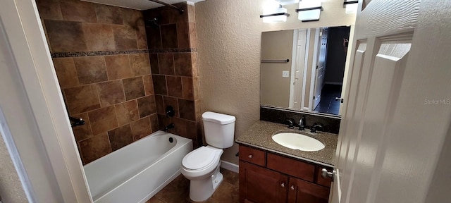 14049 Fairway Island Dr Unit 118, Orlando, FL 32837 - bathroom featuring tile patterned flooring, shower / washtub combination, vanity, toilet, and a textured wall