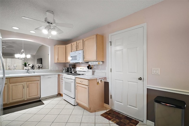 1318 Guerra Ave, The Villages, FL 32159 - kitchen featuring a textured ceiling, light brown cabinetry, a sink, ceiling fan with notable chandelier, and white appliances