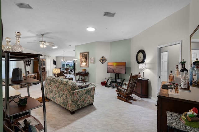 5500 Laver St, Leesburg, FL 34748 - living room featuring light wood-style floors, ceiling fan, and visible vents