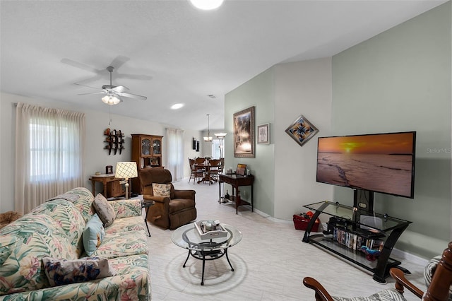 5500 Laver St, Leesburg, FL 34748 - carpeted living area with baseboards and a ceiling fan